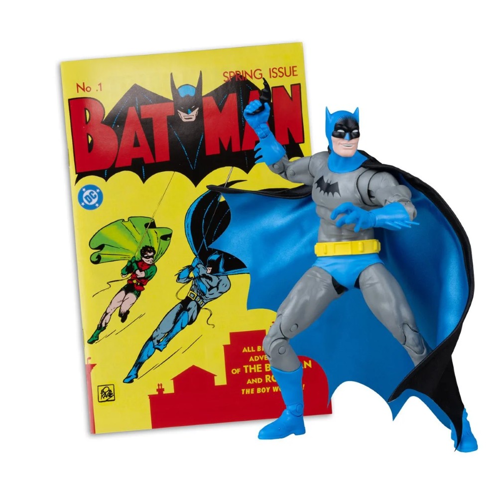 Batman action figure posed in front of a vintage Batman comic book cover