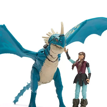 Astrid action figure standing next to Stormfly dragon toy with wings spread in How to Train Your Dragon set
