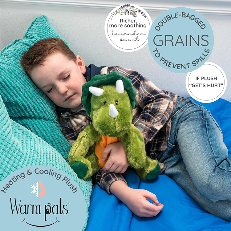 Child resting with GoFigment Dinosaur Plush Warm Pal infused with soothing lavender scent for comfort and relaxation