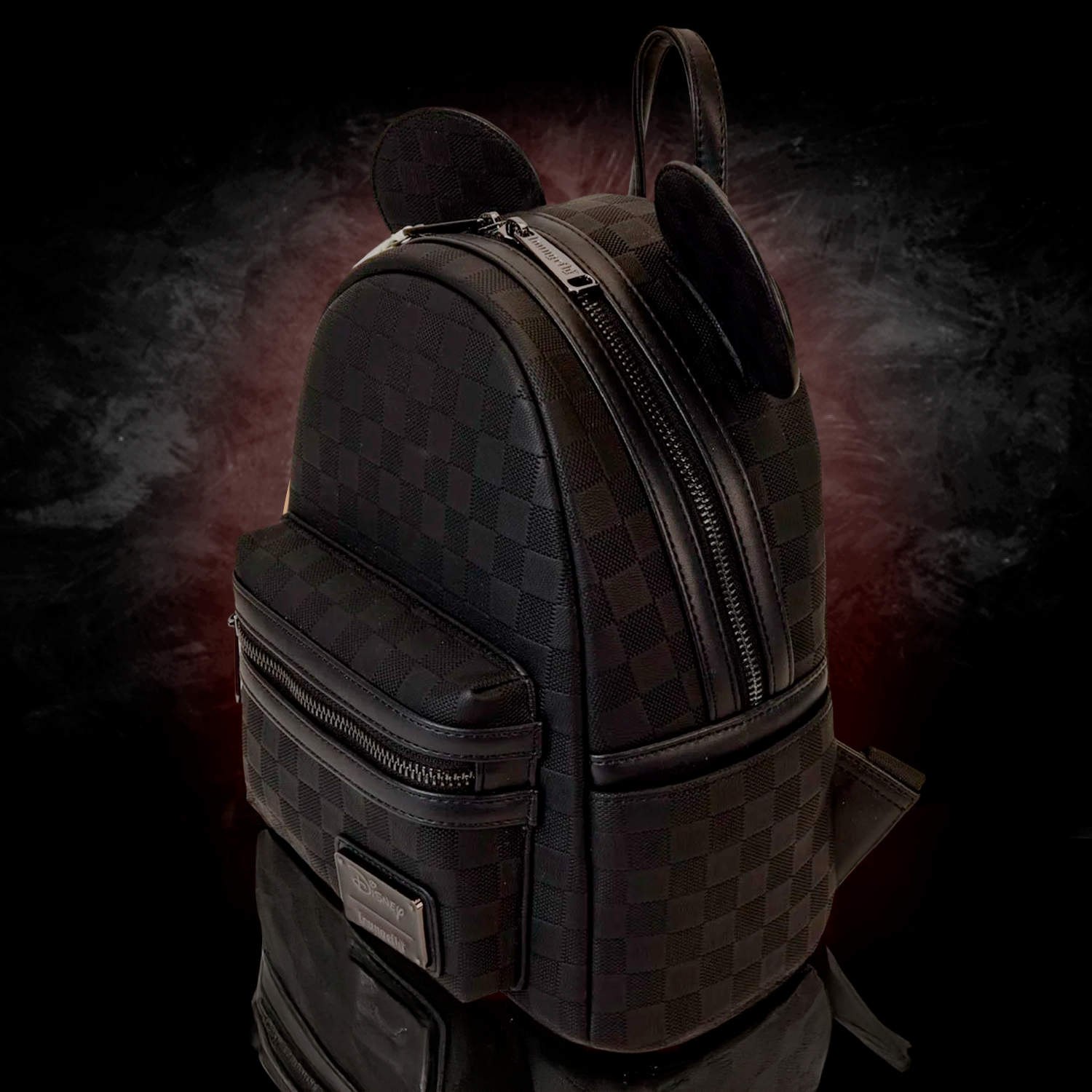 Mini Loungefly Disney Mickey Ear checkerboard pattern black backpack with front pocket and rounded ears