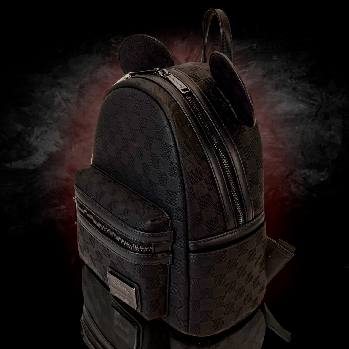 Mini Loungefly Disney Mickey Ear checkerboard pattern black backpack with front pocket and rounded ears