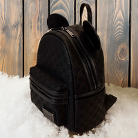 Loungefly Disney Mickey Ear mini backpack in black checkerboard pattern with ears and front zip pocket on snow background