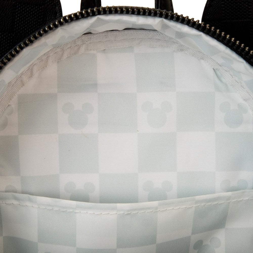 Interior lining of Loungefly Disney Mickey Ear Checkerboard Mini Backpack with subtle Mickey Mouse silhouette pattern