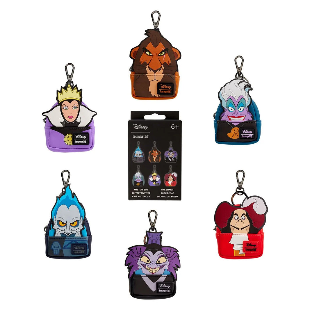 Disney villain character keychain pouches arranged around a boxed assortment, featuring colorful character designs