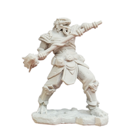 Unpainted fantasy warrior figurine holding a staff with a spiked mace on a rocky base