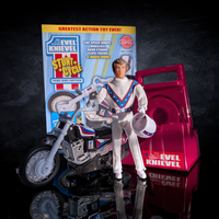 The Original 1970's Evel Knievel Stunt Cycle Upgraded And Advanced NEW collectible by Go Figment displayed with motorcycle and helmet.