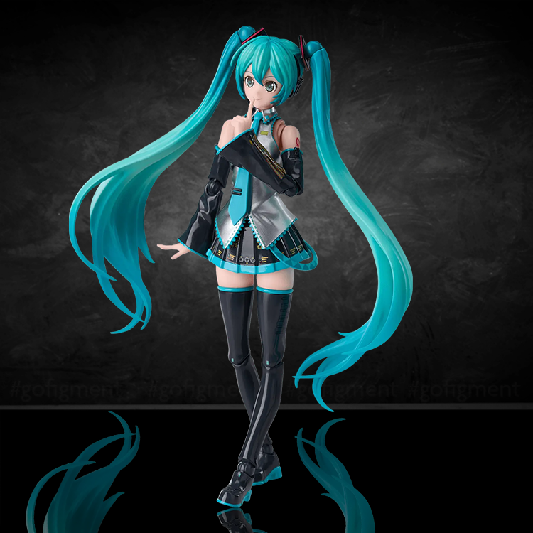 Hatsune Miku figure model kit by Blokees with teal twintails and dynamic pose on reflective surface