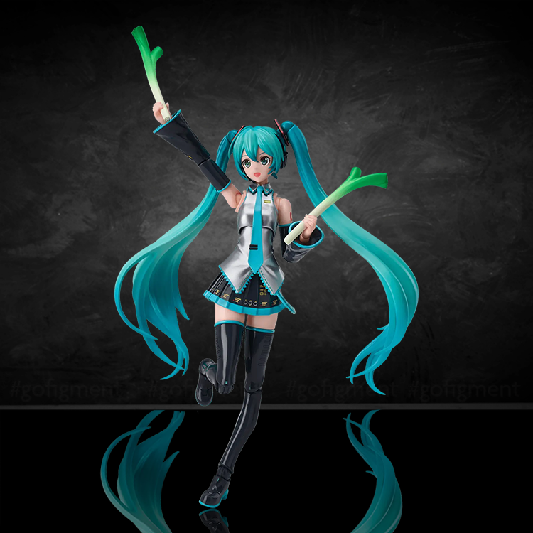 Hatsune Miku model kit by Blokees in official outfit with twintails holding leeks on black background