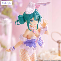 Teal-haired anime character in a bunny-themed outfit with fishnet stockings and one hand raised