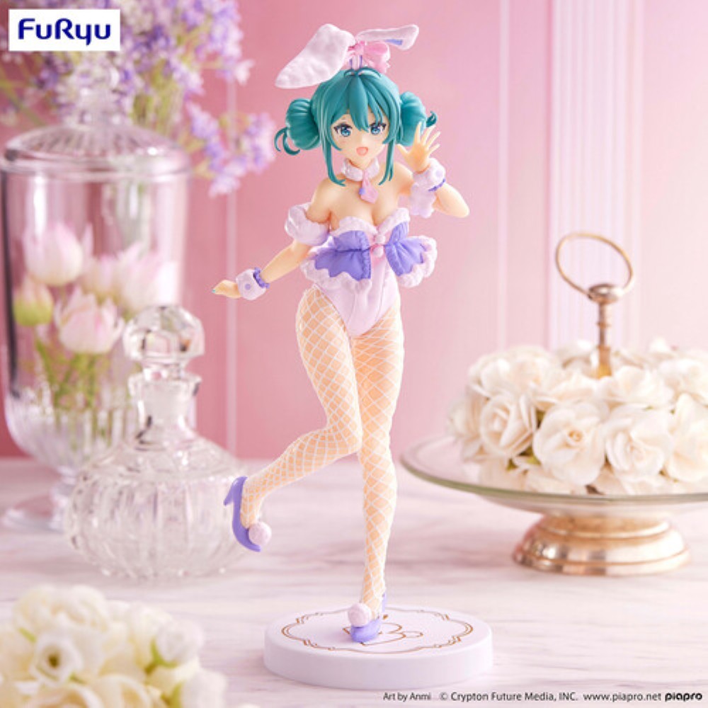 Teal haired anime character in a lavender bunny outfit posed on a round base against a pink floral background