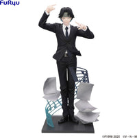 Anime style male figure in a black suit standing on a base with abstract blue and gray shapes
