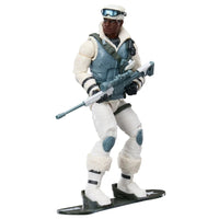 Action figure in winter gear holding a rifle while standing on skis