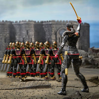 Female warrior wielding a sword faces a line of armored soldiers before a stone fortress