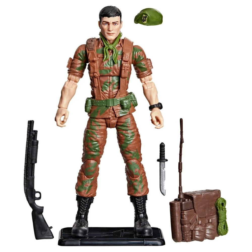 Camouflage military action figure with rifle, knife, hat, backpack, and display stand