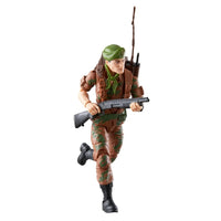 Camouflaged soldier action figure running with a rifle and green beret
