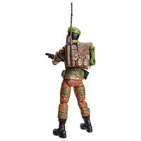 Rear view of a military action figure with a rifle, backpack, green helmet, and brown camouflage clothing