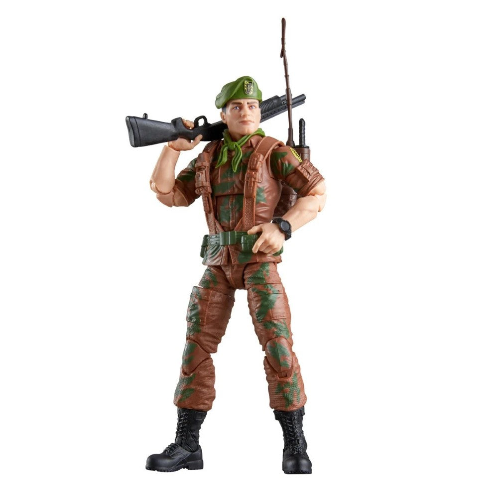 Military action figure in camouflage uniform, green beret, and black boots holding a rifle