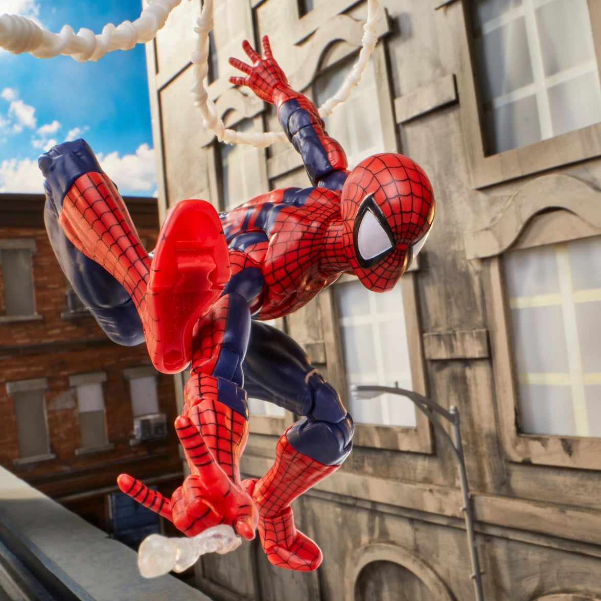 Hasbro Spiderman Marvel Legends 6 inch action figure posed mid-air with webs in detailed city backdrop