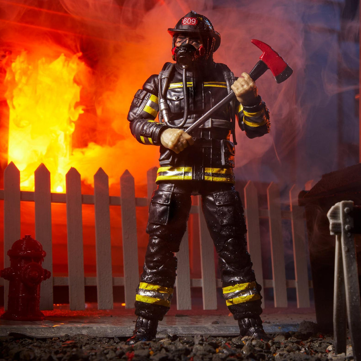 Hasbro G.I. Joe Classified Series 6-inch Search and Rescue Firefighter action figure holding fire axe by burning fence