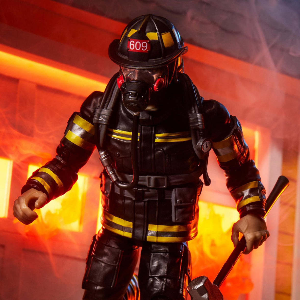 Hasbro G.I. Joe Search and Rescue Firefighter action figure in black gear with yellow stripes holding a fire axe