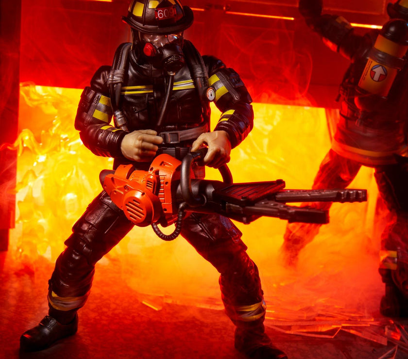 Hasbro G.I. Joe Classified Series Search and Rescue Firefighter action figure posed with chainsaw in fiery background