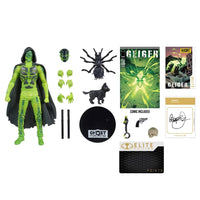 Green hooded action figure with interchangeable hands, weapons, creature accessories, a comic book, and collector cards