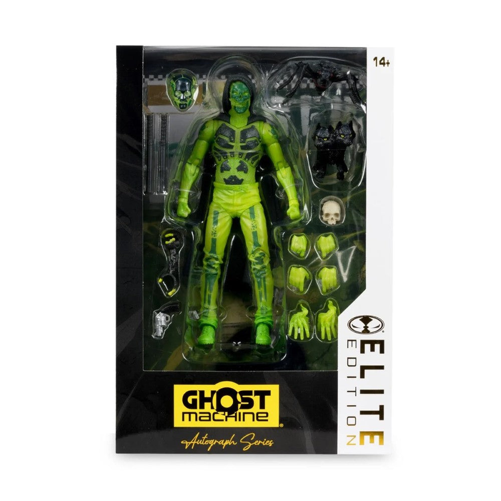 Boxed green action figure with interchangeable hands, face plates, and accessories