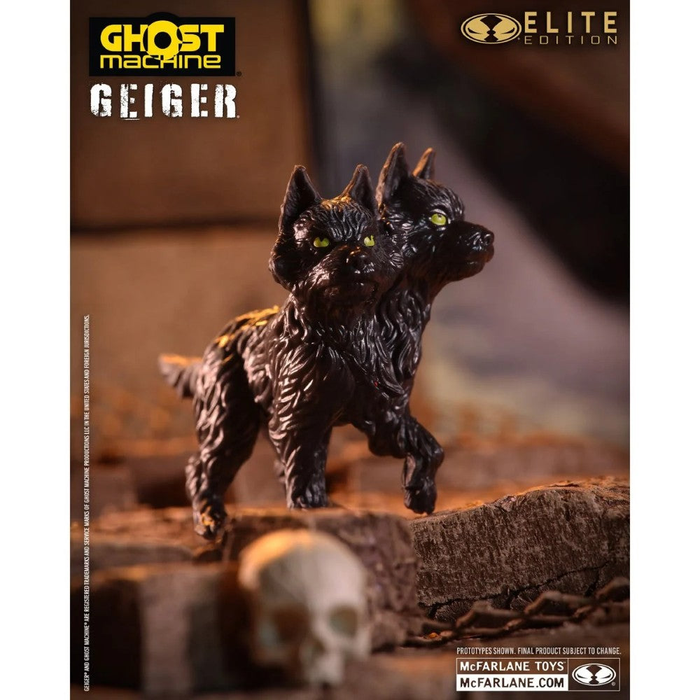Two-headed black cat creature figure on a tree branch with a skull and Ghost Machine Geiger Elite Edition branding