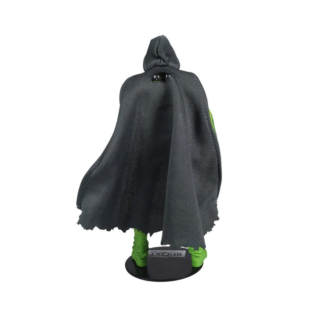Back view of a small green-legged figure wearing a black hooded cloak on a display base