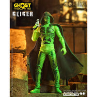 Green hooded skeletal character holding a futuristic gun in an industrial setting with Ghost Machine Geiger branding