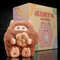 OHKU Giggle Monster Marshmallow Dreams brown plush with hidden eyes holding flower accessory in front of illustrated blind box