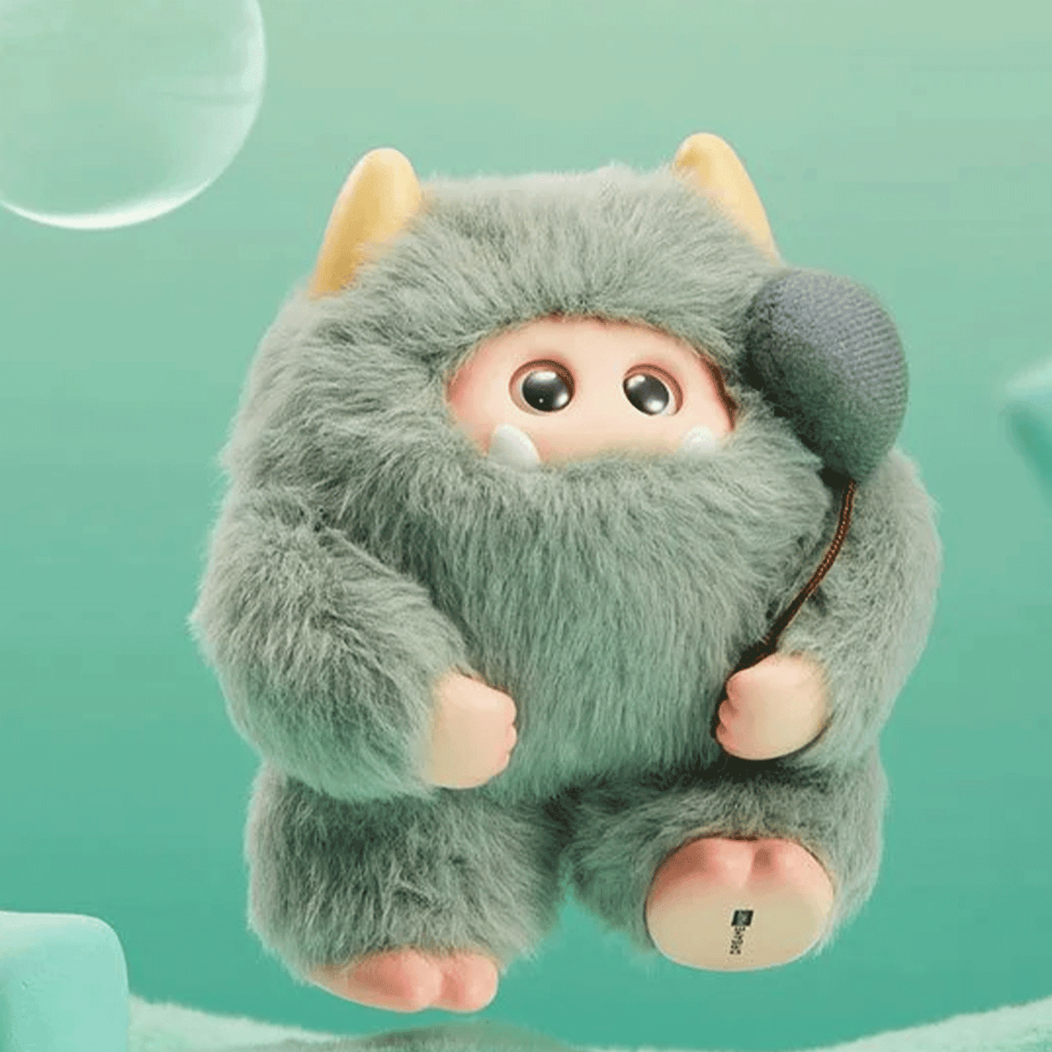 OHKU Giggle Monster Marshmallow Dreams green plush with hidden eyes clutching a soft gray balloon on teal background