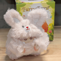 OHKU Giggle Monster Furry Forest plush figure in fluffy bunny-inspired costume with soft fur on wooden surface