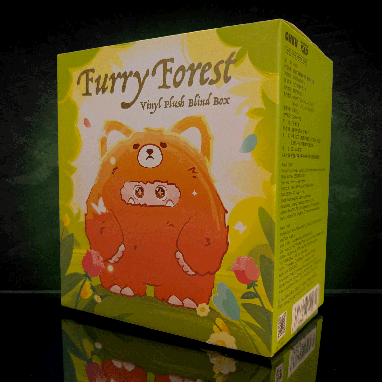 OHKU Furry Forest vinyl plush blind box featuring cute orange creature with bear hood against leafy background