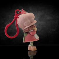 UCC World of Strawberry Shortcake flocked mini figure clip wearing pink bonnet and red plastic clip attachment side view