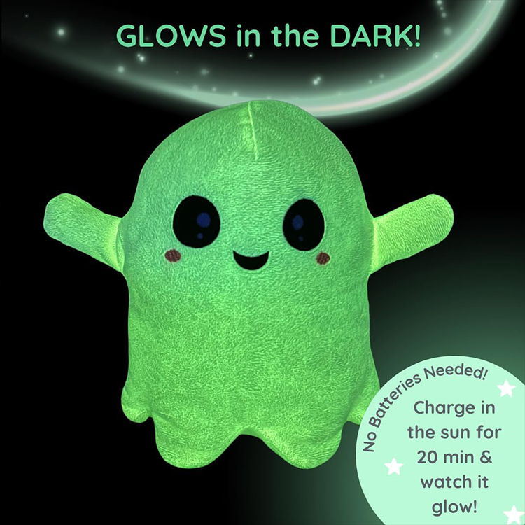 Glow in the dark green plush ghost with smiling face, no batteries needed, charges in sunlight for gentle nighttime glow