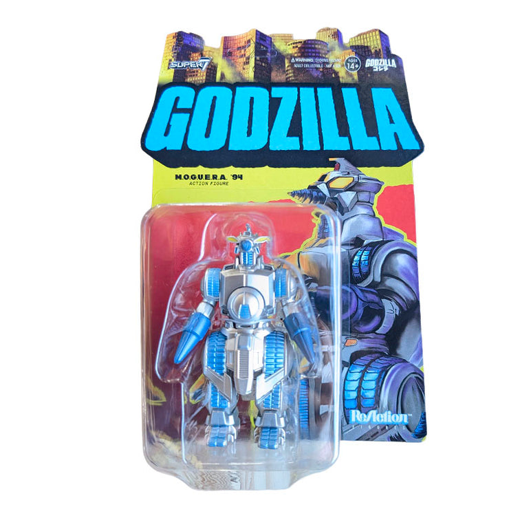 Super7 M.O.G.U.E.R.A. 1994 Godzilla action figure in blister packaging with colorful cityscape artwork.