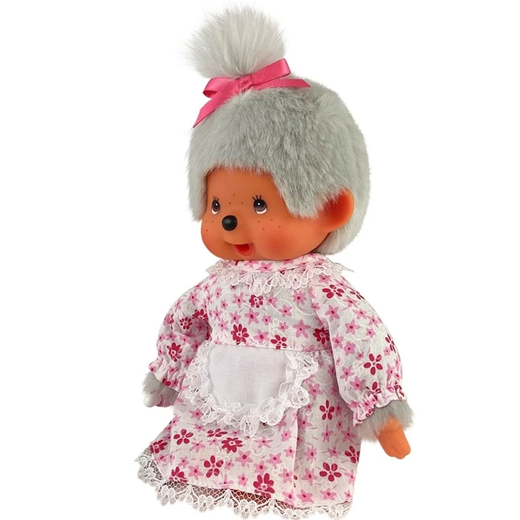 Vintage style doll with gray hair tied by pink bow, wearing floral dress with lace and white apron