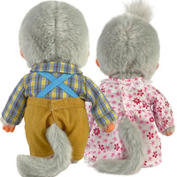 Two plush dolls dressed in vintage clothes with grey fur and bushy tails facing backward