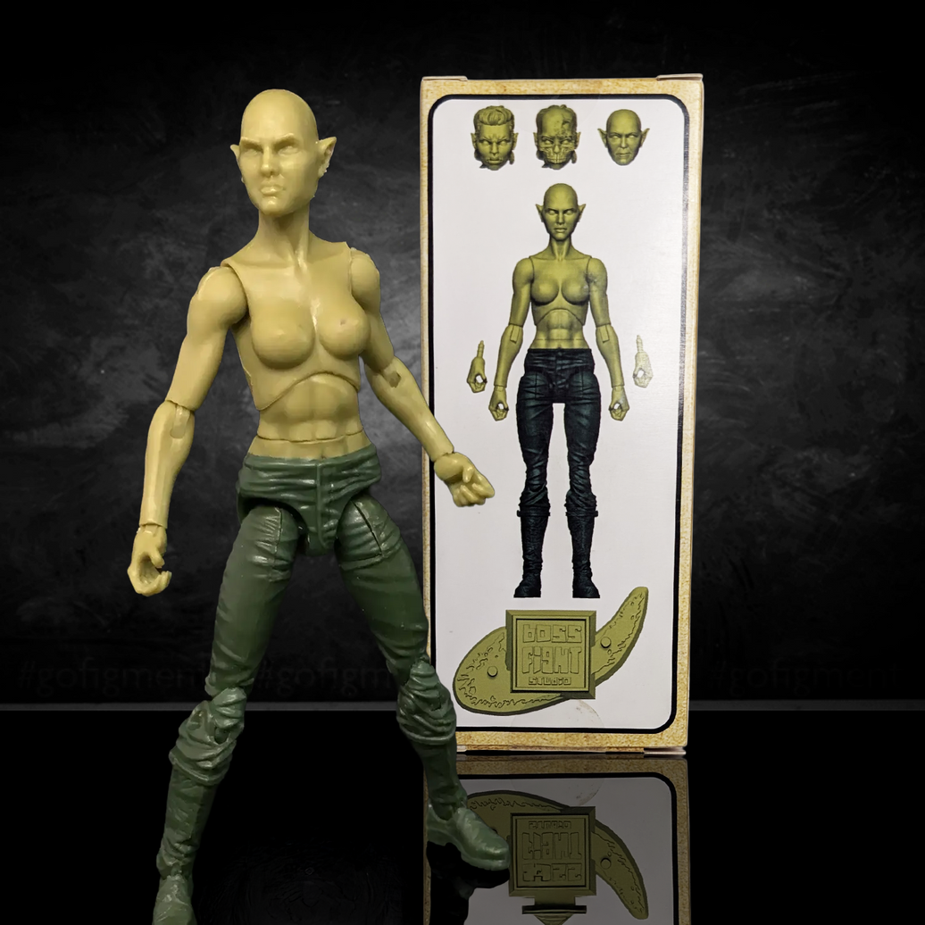 Vitruvian H.A.C.K.S. Fantasy Character Blanks Green Female Orc 1:18 Scale Action Figure by Boss Fight Studio standing with packaging behind.