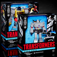 Go Figment Transformers Studio Series Grimlock and Megatron Leader Class action figure bundle in collector packaging