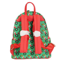 Back view of Loungefly mini-backpack with green Grinch wreath pattern and bright red adjustable straps