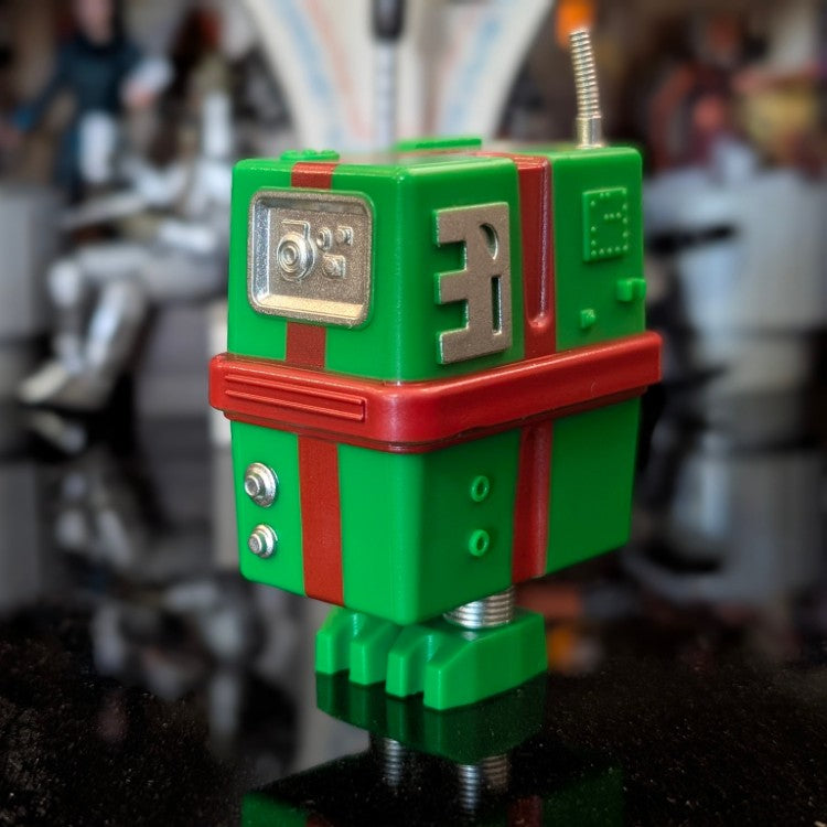 Hasbro Gronk Green Christmas Present Droid action figure in festive green and red from Star Wars Droid Factory