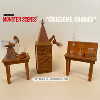 DENCOMM Monster Scenes Gruesome Goodies Limited Edition Model Kit - 55th Anniversary by Monster Scenes displayed on tables