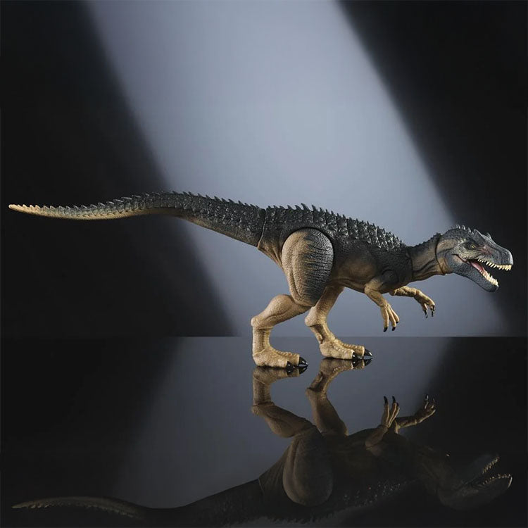 Mattel Hammond Collection Allosaurus figure posed with detailed scales and articulated limbs on reflective surface