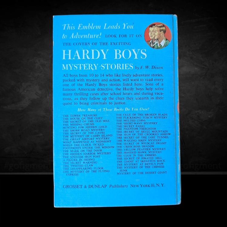 Back cover of 1959 Hardy Boys book The House on the Cliff with mystery story titles and vintage blue design