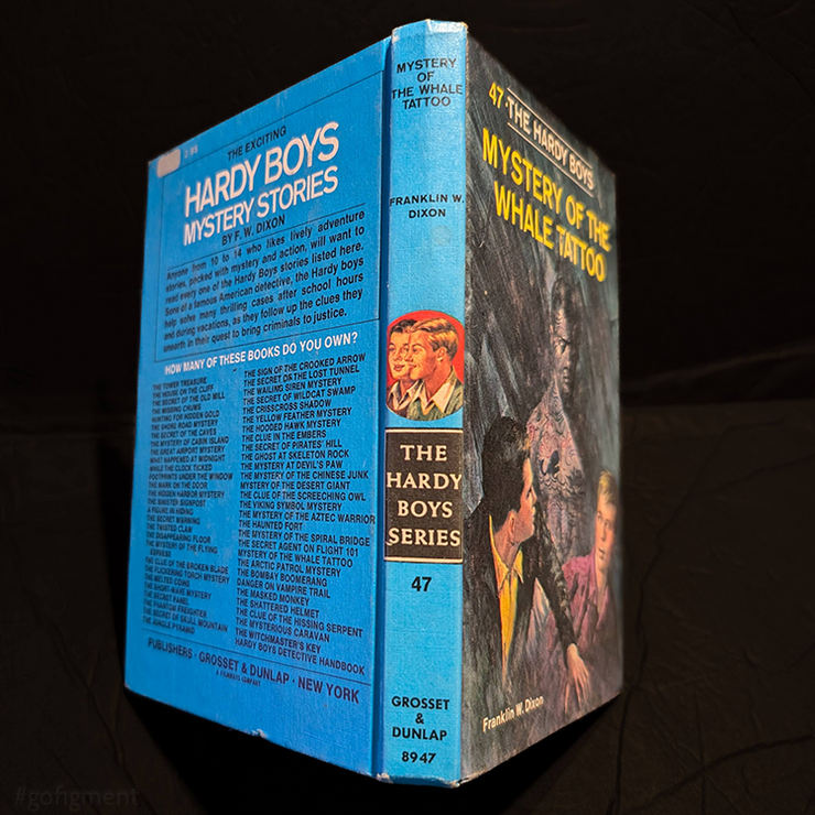 Vintage hardcover edition of Hardy Boys book The Mystery of the Whale Tattoo, number 47 in series by Grosset & Dunlap