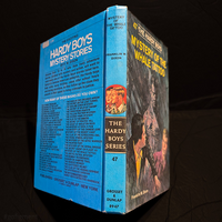 Vintage hardcover edition of Hardy Boys book The Mystery of the Whale Tattoo, number 47 in series by Grosset & Dunlap