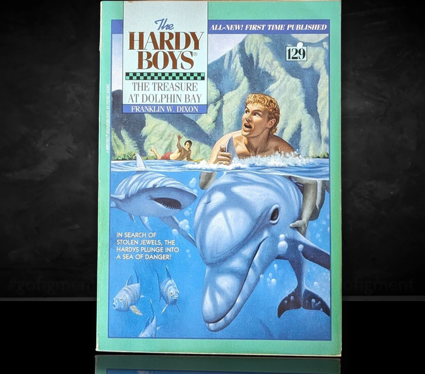 Image of a Hardy Boys Paperback book featuring 129 The Treasure at Dolphin Bay - The Hardy Boys Paperback Book - Vintage 1994