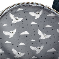 Interior view of Loungefly Harry Potter mini-backpack featuring flying white owls and cloud pattern lining